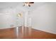 Spacious living room featuring vaulted ceilings, hardwood floors, and front door at 1919 River Park Blvd, Orlando, FL 32817