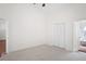 Bright bedroom with plush carpet, closet, and connecting bath at 1919 River Park Blvd, Orlando, FL 32817