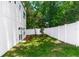 Backyard with a well-maintained lawn, a privacy fence, and lush landscaping at 21 N Hampton Ave # Lot 2, Orlando, FL 32803