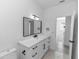 Modern bathroom with long marble-look counter, vessel sink, and black hardware at 21 N Hampton Ave # Lot 2, Orlando, FL 32803