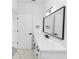 Modern bathroom with dual sinks, marble counters, and contemporary fixtures at 21 N Hampton Ave # Lot 2, Orlando, FL 32803