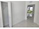 Sunlit bedroom features a closet and a serene view of the outdoors through a window at 21 N Hampton Ave # Lot 2, Orlando, FL 32803