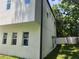 Exterior view of the home, showcasing a multi-story design and surrounding greenery at 21 N Hampton Ave # Lot 2, Orlando, FL 32803
