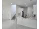 Bright kitchen showcases white cabinets and countertops, a sink, and stainless steel appliances at 21 N Hampton Ave # Lot 2, Orlando, FL 32803