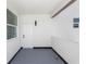 Covered patio with access door and outdoor lighting at 21 N Hampton Ave # Lot 2, Orlando, FL 32803