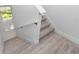 Stairway with wooden stairs and white walls at 21 N Hampton Ave # Lot 2, Orlando, FL 32803