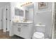 Bright bathroom features white vanity, modern fixtures, and a clean, functional layout at 217 Holborn Loop, Davenport, FL 33897