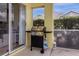 Outdoor patio featuring a gas grill for cooking and dining at 217 Holborn Loop, Davenport, FL 33897
