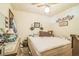 Cozy bedroom with a comfortable bed and simple decorations at 24089 Ne 152Nd Ln, Fort Mc Coy, FL 32134