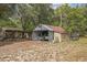 Spacious outbuilding on the property, perfect for storing boats, equipment, and tools at 24089 Ne 152Nd Ln, Fort Mc Coy, FL 32134