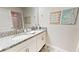 Charming bathroom featuring double sinks, granite countertop, and tasteful decorations at 3083 Tom Sawyer Dr, Kissimmee, FL 34746