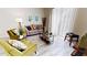 Bright living room with modern furniture, stylish decor, and large windows at 3083 Tom Sawyer Dr, Kissimmee, FL 34746
