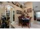Warm dining space with views into the kitchen area and convenient access to the pantry and laundry at 3188 Verbena Ct, Deltona, FL 32725