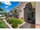 Charming home exterior with a screened doorway, brick accents, and well-maintained landscaping for curb appeal at 3188 Verbena Ct, Deltona, FL 32725