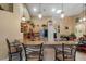 Charming kitchen with granite countertops, stainless steel appliances, and counter seating at 3188 Verbena Ct, Deltona, FL 32725