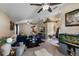 Spacious living room with a ceiling fan, neutral paint, and view to the entry foyer at 3188 Verbena Ct, Deltona, FL 32725