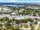Gorgeous aerial view of the neighborhood, showing lake views and nearby commercial district at 3474 Fairway Ln, Orlando, FL 32804