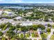 Gorgeous aerial view of the neighborhood, showing lake views and nearby commercial district at 3474 Fairway Ln, Orlando, FL 32804