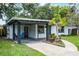 Charming single-story home with a well-manicured lawn and inviting curb appeal at 3474 Fairway Ln, Orlando, FL 32804