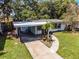 Charming single-story home with a well-manicured lawn and inviting curb appeal at 3474 Fairway Ln, Orlando, FL 32804