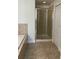 Bathroom featuring a glass-enclosed shower, offering modern style and functionality at 3530 Rodrick Cir, Orlando, FL 32824