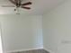 Bright and airy bedroom with wood-look floors and ceiling fan at 3530 Rodrick Cir, Orlando, FL 32824