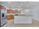 Well-equipped kitchen featuring stainless steel appliances and a breakfast bar at 3530 Rodrick Cir, Orlando, FL 32824