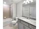 Traditional bathroom featuring a granite vanity, tile flooring, and a shower-tub combination at 3737 Plainview Dr, Orlando, FL 32824