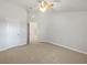 Spacious bedroom with neutral carpet and a ceiling fan, perfect for relaxation and rest at 3737 Plainview Dr, Orlando, FL 32824