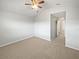 Bedroom with neutral carpet and attached bath access, provides comfort and convenience at 3737 Plainview Dr, Orlando, FL 32824