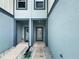 Inviting front entrance featuring dual doorways and modern architectural design at 3737 Plainview Dr, Orlando, FL 32824