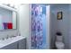 Bathroom with shower stall, vanity with sink, and new toilet at 4515 Isaac Ln, Sanford, FL 32771