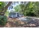 Charming home with a inviting porch and mature trees at 4515 Isaac Ln, Sanford, FL 32771