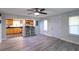 Open-concept living area flows into the kitchen, offering a breakfast bar at 4515 Isaac Ln, Sanford, FL 32771