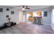 An open-concept living room seamlessly connecting to a breakfast bar and kitchen at 4515 Isaac Ln, Sanford, FL 32771