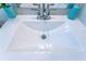 Bathroom sink with chrome faucet and decorative soap dispensers at 4515 Isaac Ln, Sanford, FL 32771