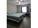 Cozy bedroom with natural light, and ceiling fan at 4936 Tangerine Ave # 4936, Winter Park, FL 32792