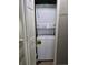 Convenient laundry area with a stacked washer and dryer at 4936 Tangerine Ave # 4936, Winter Park, FL 32792