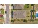 Aerial view of a house showing the backyard, pool, and surrounding neighborhood at 567 Pinecrest Loop, Davenport, FL 33837