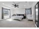 Main bedroom with a tray ceiling, two windows, and Bedroom; the perfect relaxing retreat at 567 Pinecrest Loop, Davenport, FL 33837