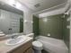 Bathroom featuring a shower-tub combination, and a vanity sink with a large mirror at 592 Orange Dr # 142, Altamonte Springs, FL 32701