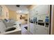 Convenient laundry room with coin-operated washers, dryers, and tiled floors at 592 Orange Dr # 142, Altamonte Springs, FL 32701