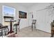 Bonus room features a bar and a picture window at 606 Marion Oaks Blvd, Ocala, FL 34473