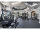 Well-equipped gym with treadmills, weights, and various exercise machines at 6169 Metrowest Blvd # 102, Orlando, FL 32835