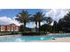 Resort-style pool and fountain offering a relaxing oasis with lush landscaping and convenient lounge seating at 6169 Metrowest Blvd # 102, Orlando, FL 32835