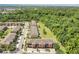 An aerial view of the home's beautiful community shows lush landscaping and multiple amenities at 617 Joyful Blossom Pl, Longwood, FL 32750