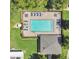 An aerial view of the pool shows lots of seating and space for community members to enjoy the water and outdoor fun at 617 Joyful Blossom Pl, Longwood, FL 32750