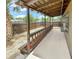 Spacious backyard featuring a covered patio and privacy fence at 721 Rock Creek Loop, Longwood, FL 32750