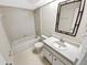 Well-lit bathroom with a shower-tub combo and a vanity at 721 Rock Creek Loop, Longwood, FL 32750