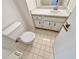 Cozy bathroom featuring neutral tiling and a toilet at 721 Rock Creek Loop, Longwood, FL 32750